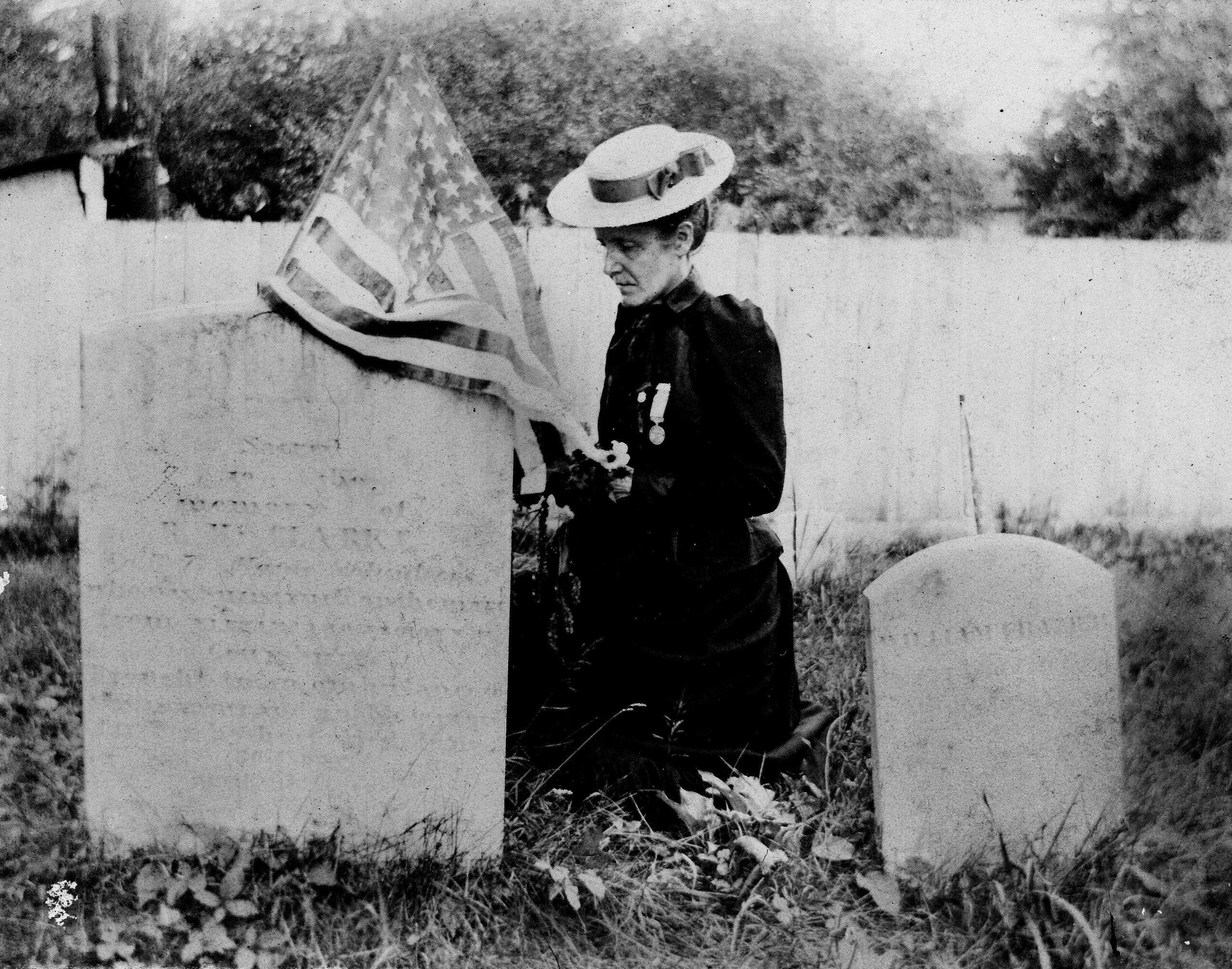 Mary Bostwick Shellman visiting the grave of Lt. R.H. Clark